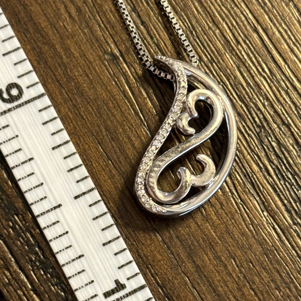 Silver heart infinity necklace with stones